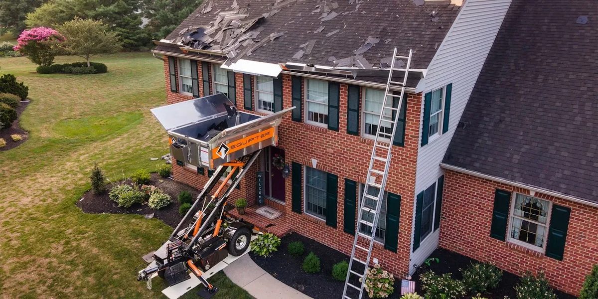Roofing installation in progress — aerial view